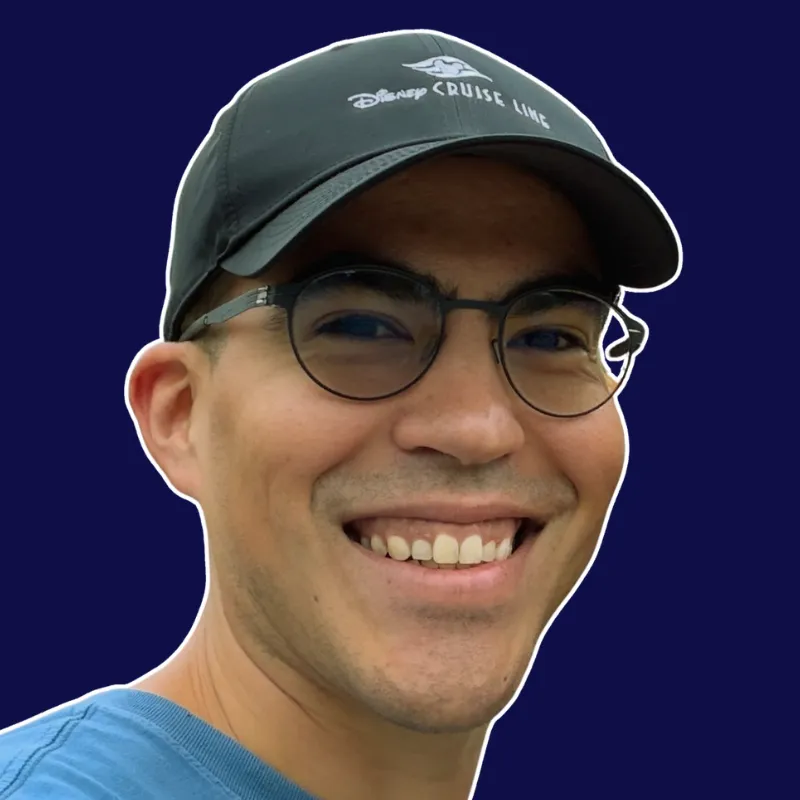 Casual portrait of Rafael Negron smiling at the camera.